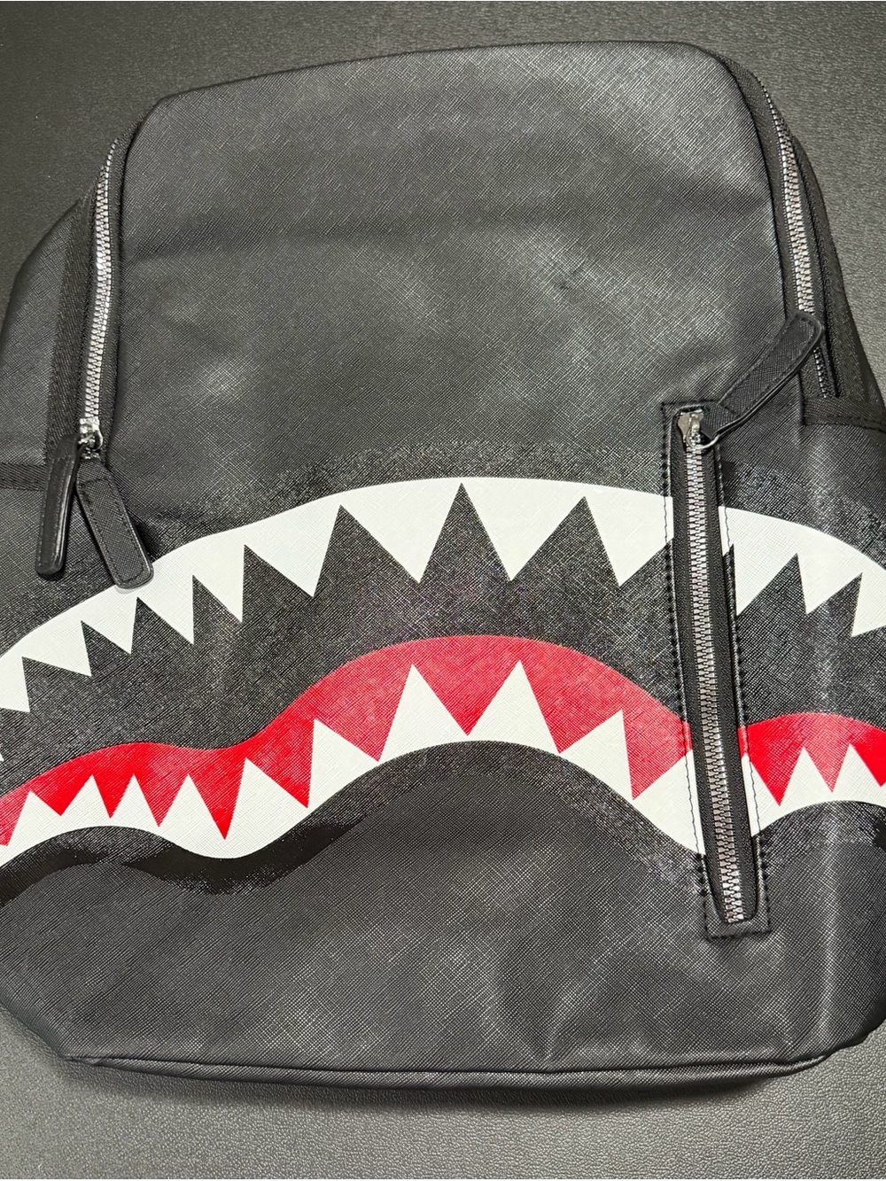 Black Backpack with Shark-Mouth Graphic and Red Accent